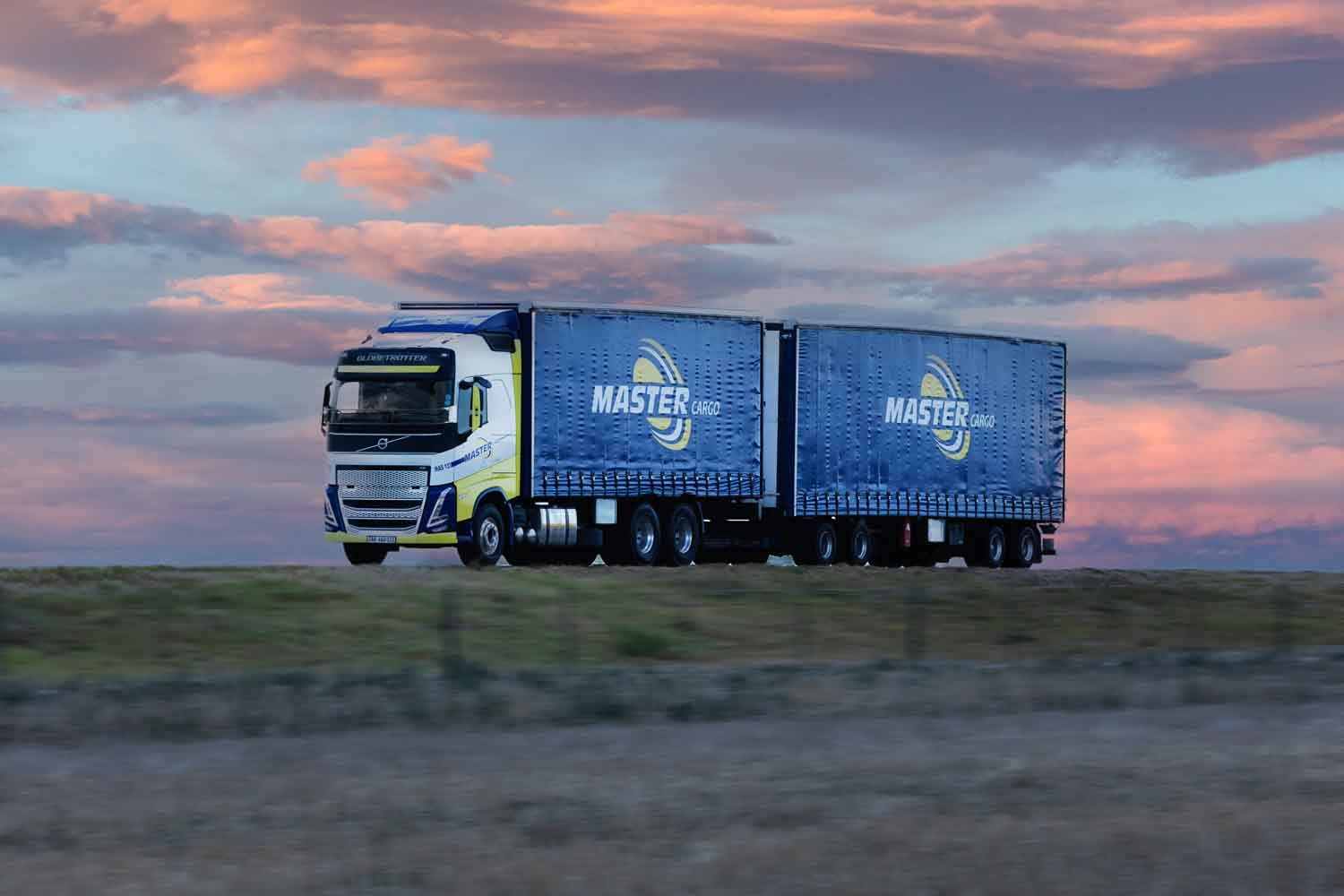 Master Cargo rigid truck at sunset